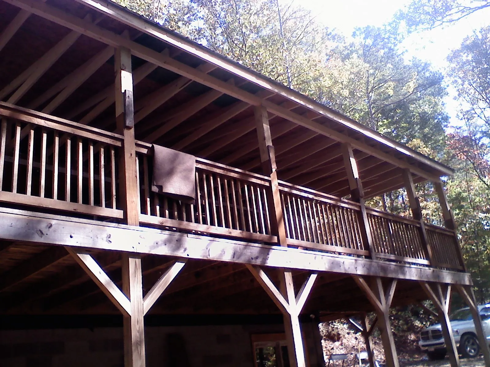 Timber framing under a new elevated porch and deck — Roof Leak Repair in Hamilton City by Roofing Brothers